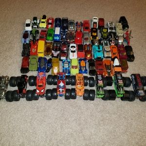 Over 50 Hot Wheels & a few Monster Trucks